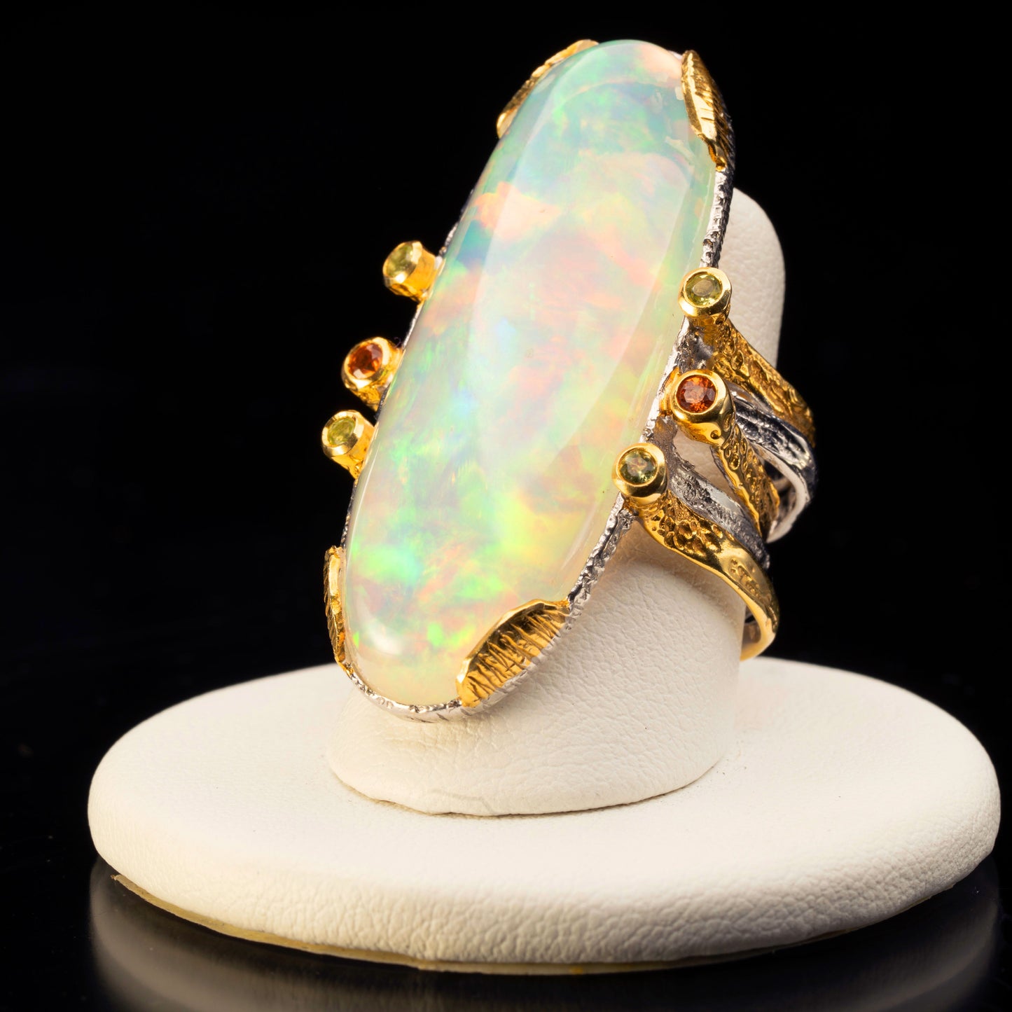 Ethiopian Opal, Peridot, and Sapphire Ring