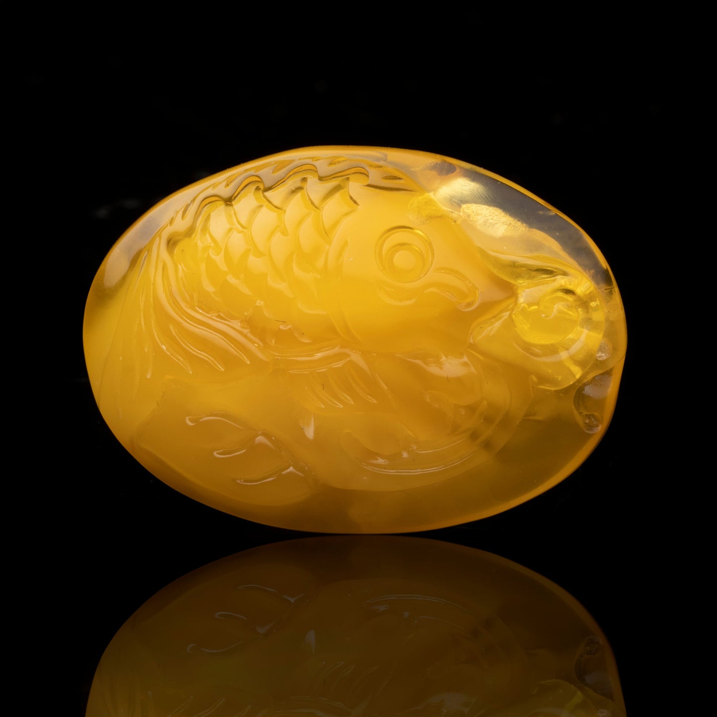 Carved Butterscotch Amber Fish Pendant // 8.67 Grams